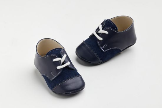 Παπουτσάκι αγκαλιάς σε μπλε λείο δέρμα και μπλε καστόρ δέρμα