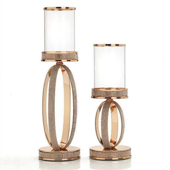 Σετ λαμπάδων γάμου με κρυστάλλινα κηροπήγια, χρυσές λεπτομέρειες και λευκά αρωματικά κεριά.